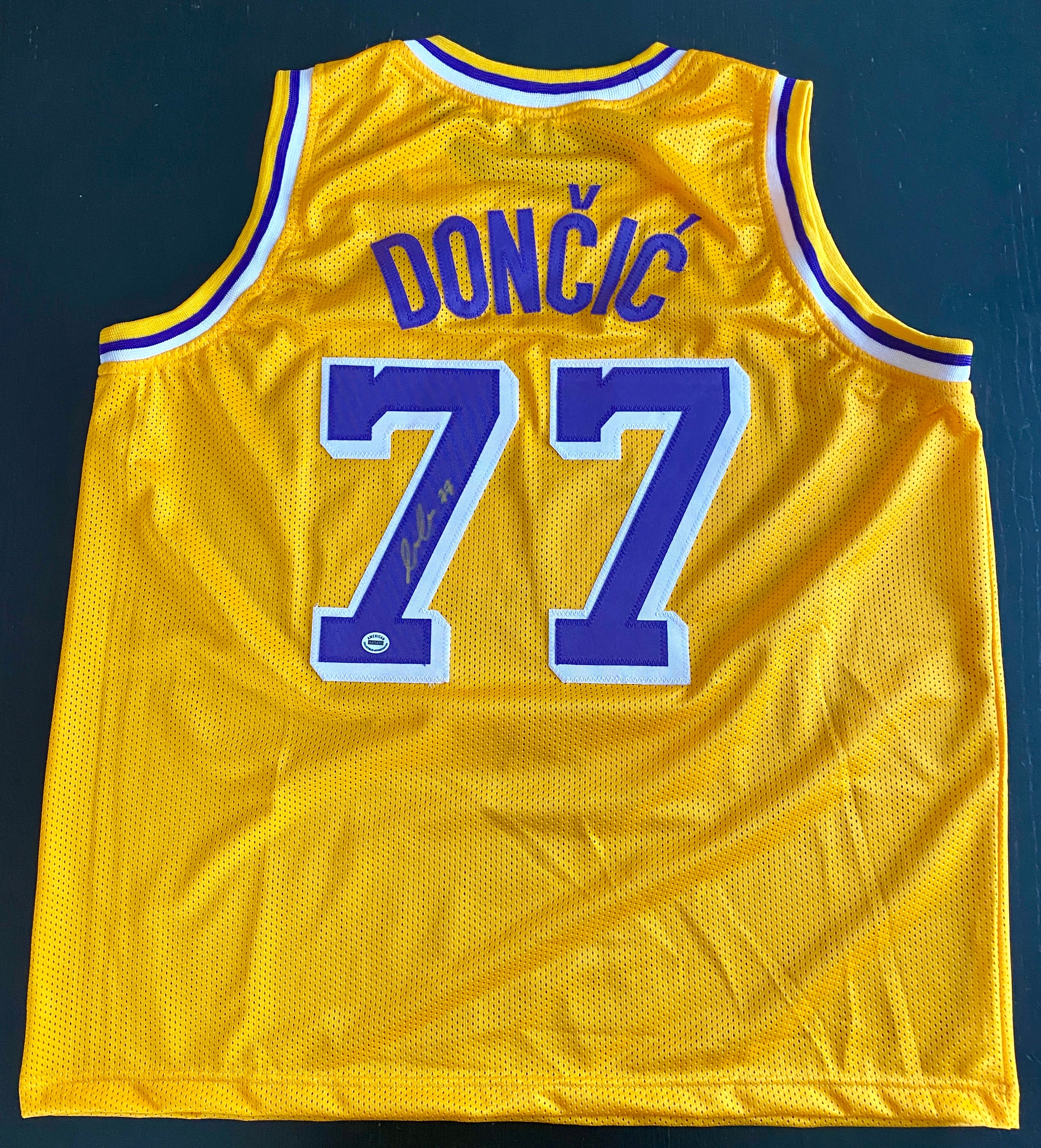Luka Doncic Signed Jersey With COA (A45489) (Lakers)